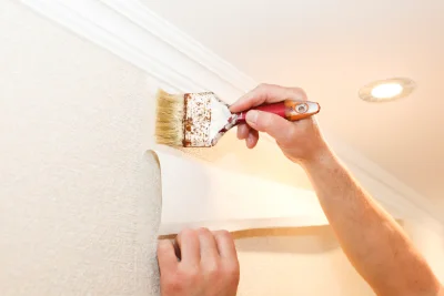 Pose de papier peint à Coltines — revêtements muraux et toiles de verre